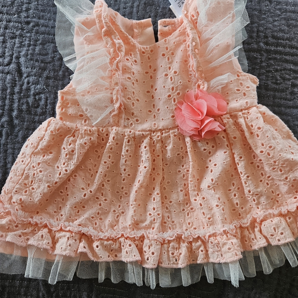 Toddler dress. More of a Peach Color. Would be cute for spring.